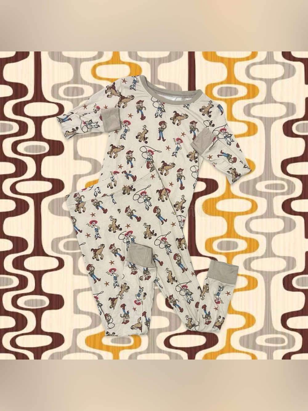 No Name Bamboo Toy Story Pyjamas
Top has a mark
4-5 years 
Beige